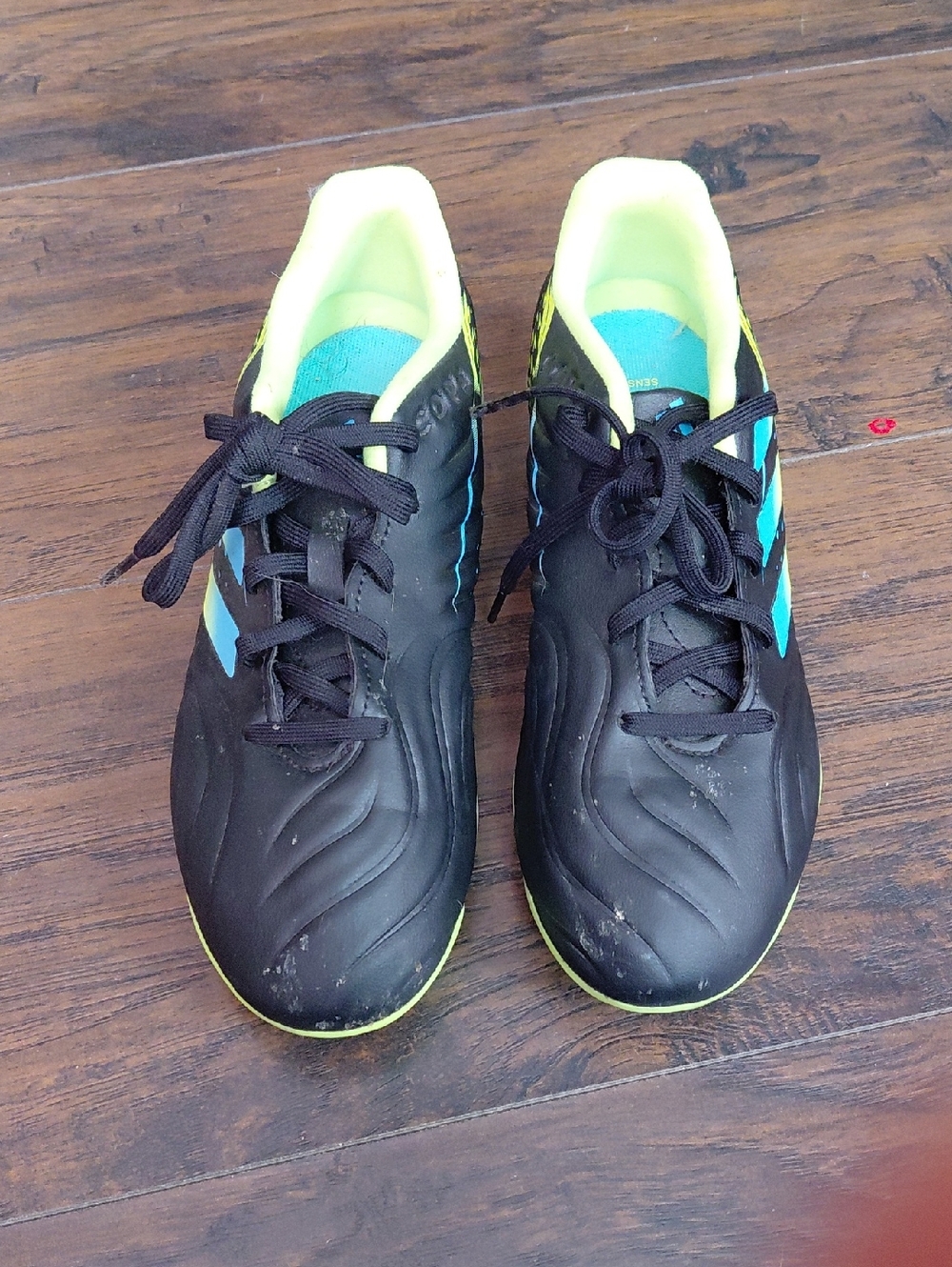 adidas Black Athletic Shoes with Teal and Neon Yellow Accents